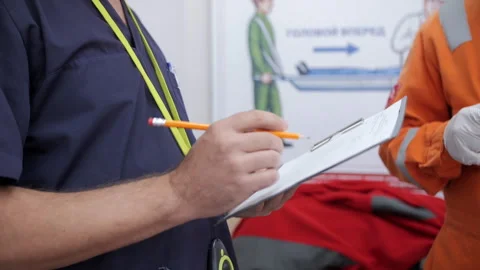 Medical Instructor Taking Notes During Training Stock Footage 321526862