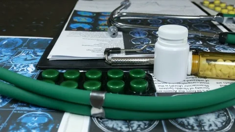 Medical instruments and X-rays on the medical table Video stock 88295535