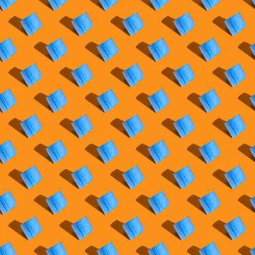 Medical mask seamless pattern. Made in a flat style on a orange yellow backgr Stock Illustration