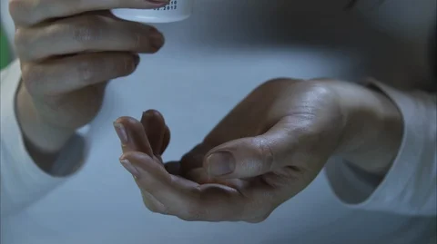 Medical pill on hand Stock-Footage 112106903
