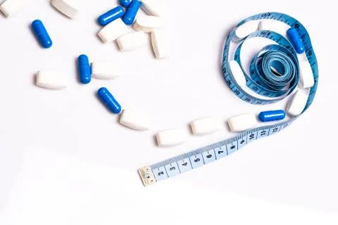 Medical pills and centimeter, for weight loss or increase penis size Foto stock