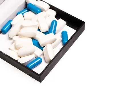 Medical pills in a black luxury box for good health Stock Photos