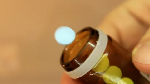 Medical pills falling down. Bottom view Stock Footage 86572076
