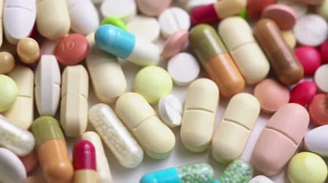 Medical pills turning in a loop Stock Footage 23306048