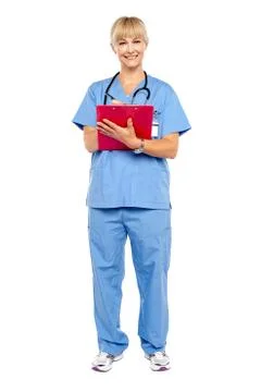Medical practitioner posing with a clipboard Stock Photos