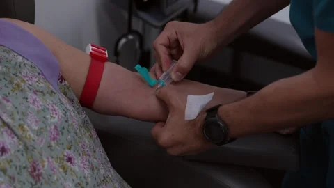 Medical Professional Inserting Iv Needle Into Patient Arm For Blood Test Stock Footage 340875853