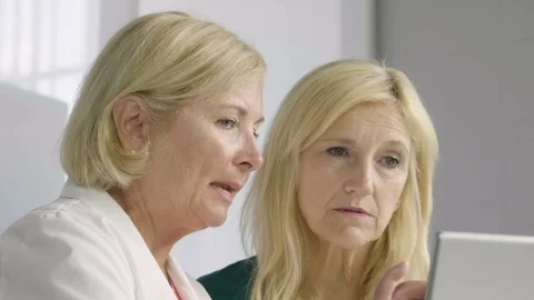 Medical professionals looking at a computer screen Stock Footage 112224169