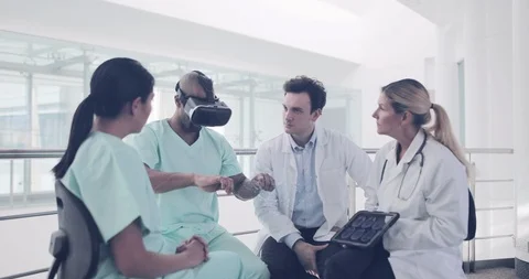 Medical professionals practicing with virtual reality technology Stock Footage 123081421