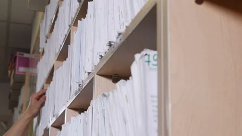 Medical records in archives. catalog in clinic. Healthcare clinic. Oldfashioned Stock Footage