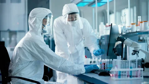 Medical Research Laboratory Scientists Developing Covid Vaccine Stock Footage 140181846