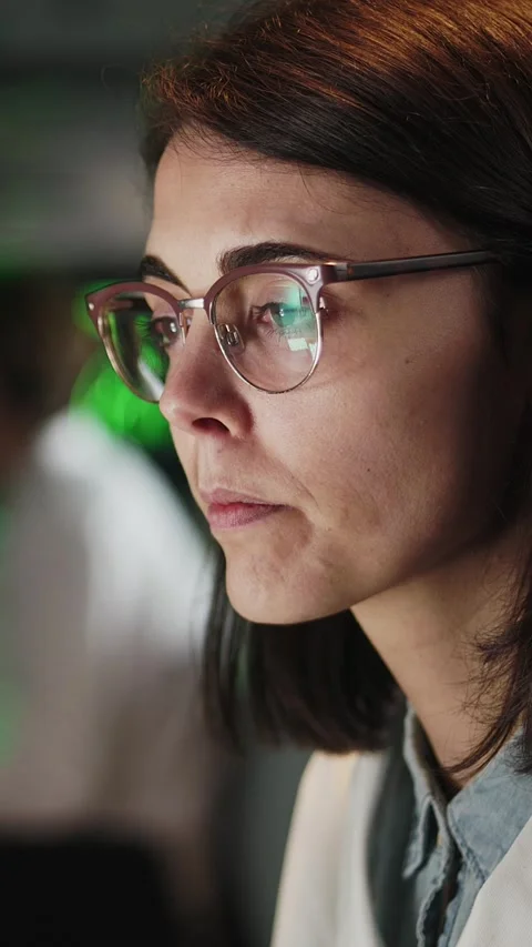 Medical researcher analyzing data on computer monitors in laboratory Stock Footage 316792742