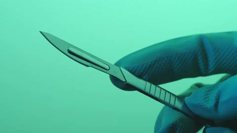 Medical Scalpel With Gloves Close-up Shot Stock Footage 147866283