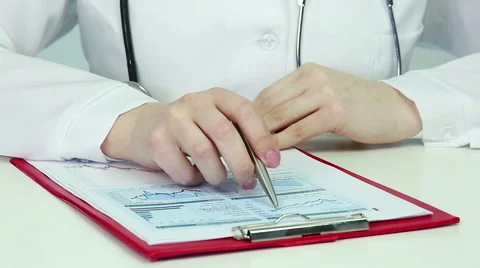Medical scientist doing research, comparing graphs, statistics. Data analysis Stock Footage 60843239