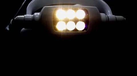 Medical shadowless lamp on black background Stock Footage 62564657