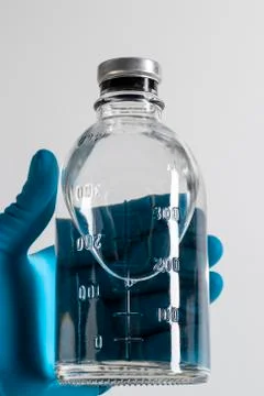 Medical solution in a bottle. Stock Photos