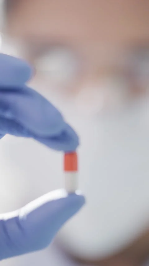 Medical, solution or hands in lab with pill, drug testing or product exam in Stock Footage 331579508