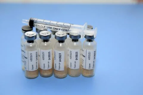 Medical solutions bottles ampoules antibiotics antiviral syringes Stock Photos