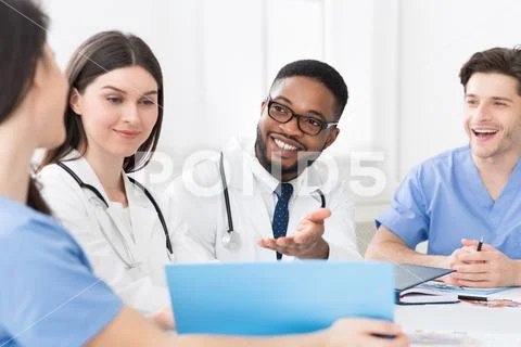 Medical staff having discussion in modern hospital Stock Photos