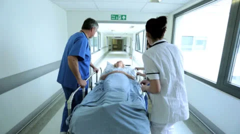 Medical Staff Transferring Patient Hospital Bed Slow Motion Stock Footage