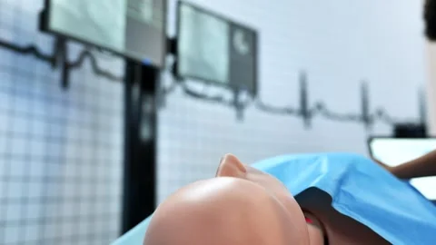 Medical students developing skills using simulation mannequin for CPR training Stock Footage 323322116