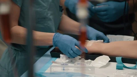 Medical Students in Lab Practicing IV Placement Stock Footage 86881349