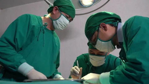 The medical team and nurses  Performing Surgical Operation patients in the op Stock Footage 159707524