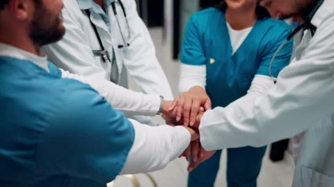 Medical, team and stack hands in hospital for support, celebration and applause 库存影片 335942238
