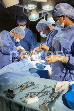 Medical team doctors hospital surgery operation Stock Photos