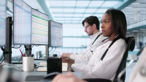 Medical Team Doing Bill Coding Stock Footage 303660987