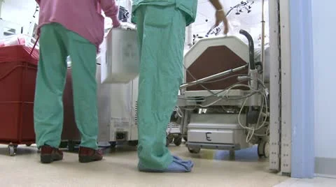 Medical team transports patient for surgery Stock Footage