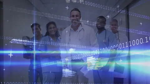 Medical team walking toward camera in corridor with blue beam and digital code Stock Footage 314741565