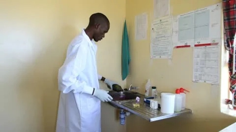Medical technician testing blood samples in laboratory. Kenya, Africa. Video stock 9275670