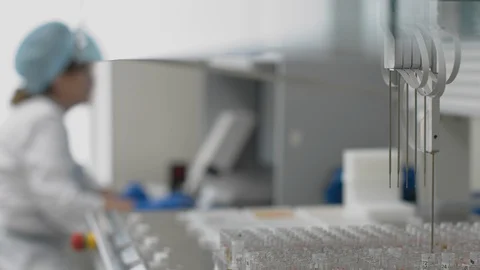 Medical tests using automated machine, diagnosing viral infections and diseases Stock Footage 127869286