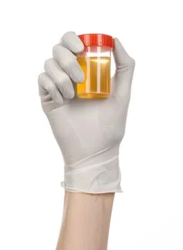 Medical theme: doctor's hand in white gloves holding a transpare studio Stock Photos