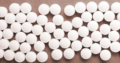 Medical white pills move on  automatic line Stock Footage 150398944