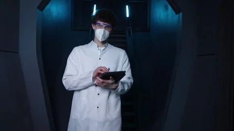 Medical worker analyzing the data while developing vaccine against deadly virus Stock Footage 241558078
