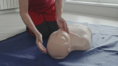 Medical Worker Doing CPR On Dummy Stock Footage 223929918