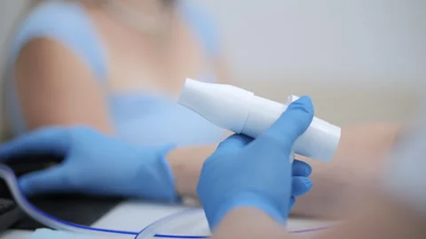 Medical worker holding diagnostic spirometer Stock Footage 314137763