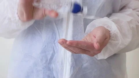 A medical worker, before a shift in the red zone with patients infected with a Stock Footage 168410047