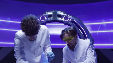 Medical workers using protective glasses and gloves while working with drugs Stock Footage 240655509