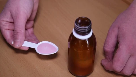 Medicament For Children Scattering In The Spoon Stock Footage 73064853