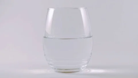 Medicated Effervescent Tablet Drops into Drink to Provide Relief Stock Footage 74605689