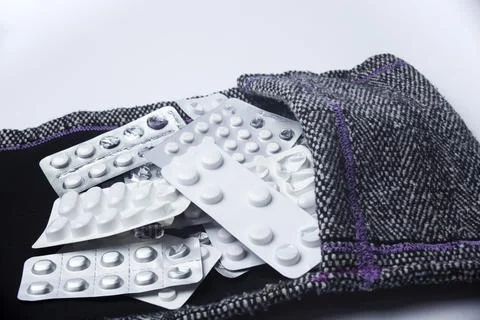 Medication holder in textile bag Stock Photos