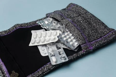 Medication holder in textile bag Stock Photos