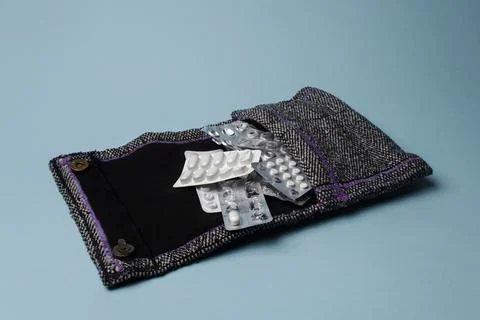 Medication holder in textile bag Stock Photos