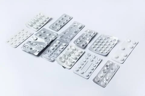Medication holders in white background Stock Photos