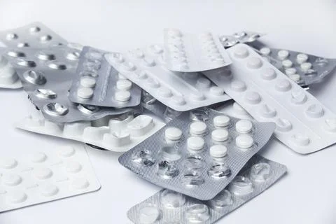 Medication holders in white background Stock Photos