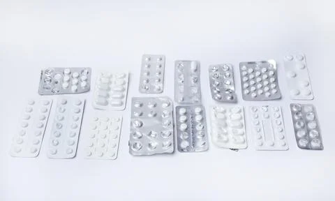 Medication holders in white background Stock Photos