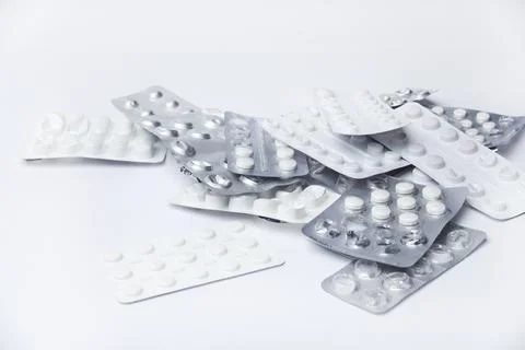 Medication holders in white background Stock Photos