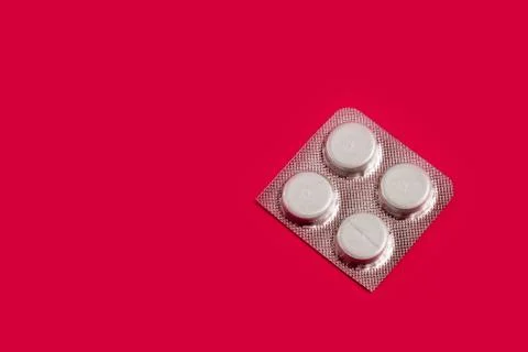 Medication pills on a plain background. copy space one Stock Photos